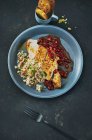 Chicken breast with couscous salad and pomegranate sauce — Stock Photo