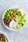 Vegetarian lunch bowl with marinated egg and edamame beans — Stock Photo