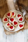 Heart biscuits on wooden background — Stock Photo