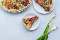 Vegetarian quiche with betroot tops and cheese — Stock Photo