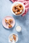Fried beignets and a glass of milk — Stock Photo