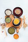 Various dry legumes in the bowls — Foto stock