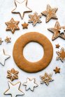 Unfinished gingerbread wreath with stars cookies — Stock Photo