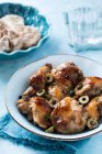 Roasted chicken with olives — Stock Photo