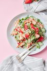 Quinoa salad with strawberries, cucumber and mint — Stock Photo