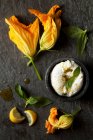 Zucchini flower with mozzarella and Basil — Stock Photo