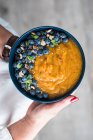 Peach Smoothie Bowl with blueberries — Stock Photo
