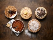 Various pies served on table, top view — Stock Photo