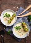 Vegan parsnip cream soup with roasted Brussels sprouts — Stock Photo