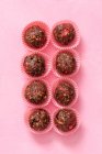 Sugar free, raw, vegan, energy protein balls made with dates, almonds, coconut oil, cocoa nibs and freeze dried strawberries — Stock Photo