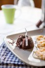 Chocolate cake with stewed rhubarb — Stock Photo