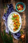 Roast vegetables with Gervais cream cheese, ajvar and sprouts — Stock Photo
