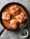 Baked pork ribs with tomato sauce and cheese. — Stock Photo