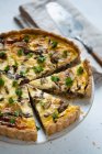Tart with mushrooms and goat cheese — Stock Photo