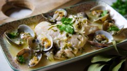 Hake with clams, closeup shot — Stock Photo