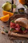 A bresaola roll with spinach — Stock Photo