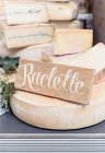 Close-up shot of Raclette Cheese on market table - foto de stock