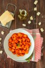 Ricotta gnocchi with tomatoes sauce — Stock Photo