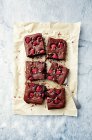 Chocolate brownie with raspberries made with rice flour - foto de stock