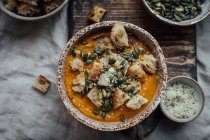 Pumpkin soup with carrots, paprika, zucchini, onions and garlic — Stock Photo