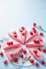 Cheesecake made with cream cheese, raspberry puree and set with raspberry jelly — Stock Photo