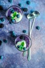 Blackberry and blueberry smoothie with cream ice cream and fresh mint — Stock Photo