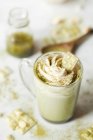 Matcha White Hot Chocolate with whipped cream and matcha powder — Stock Photo