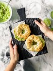 Bagels with avocado lime salad — Stock Photo