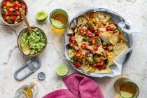 Vegan nachos with guacamole — Stock Photo