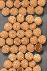 Close-up shot of delicious lot of spelt cookies with almonds — Stock Photo