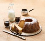 Close-up shot of Sliced Bundt with coffee and milk — Stock Photo