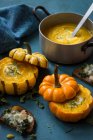 Pumpkin soup with rosmary and yogurt, toasts with pears, kale and gorgonzola — Stock Photo