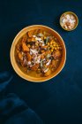 Bowl of pumpkin soup with lemon and garlic — Stock Photo