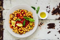 Chick pea salad with zucchini in plate — Stock Photo