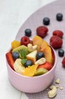Close-up shot of Fruit salad with cashew nuts — Stock Photo