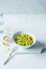 Zucchini salad with prawns, broccoli and pine nuts — Stock Photo