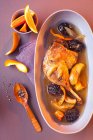 Leg of duck with fruits — Stock Photo