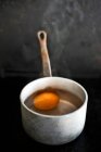 A hard-boiled egg in a saucepan — Stock Photo