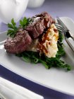 Plate of spinach, mashed potatoes and fillet steak — Stock Photo
