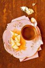 Espresso and chocolate cream with pear in orange liqueur — Stock Photo