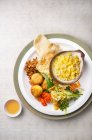 Nasi Jagung (Indonesian corn rice) with side dishes — Stock Photo