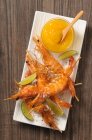 Grilled prawn skewers with mango dip — Stock Photo
