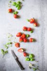 Strawberries and basil close-up view — Stock Photo