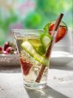 A glass of Pimms number one in a garden setting — Stock Photo