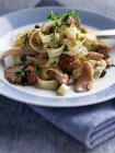 Close-up shot of delicious Tagliatelles with wild mushrooms — Stock Photo