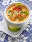 A bowl of Thai salmon laksa — Stock Photo