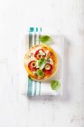 Mini pizza with green olives and salami — Stock Photo
