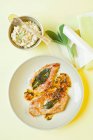 Saltimbocca in masala sauce with risotto — Stock Photo