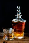 Whisky in a glass and a French Crystal Saint Louis carafe — Stock Photo
