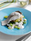 Steamed cod with broccoli, new potatoes, beans, leeks and cappuccino sauce — Stock Photo